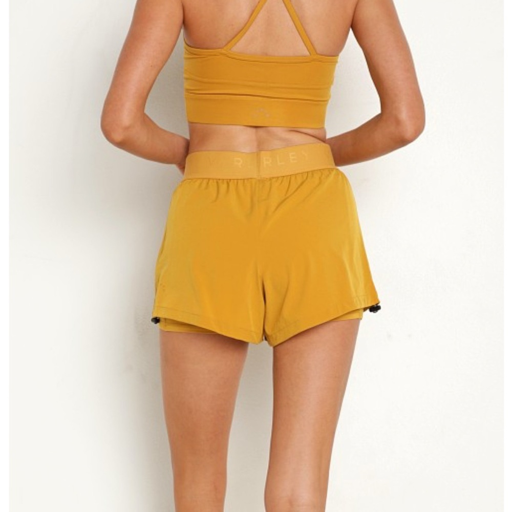 Varley| NWT Women's Size Small Yellow Chai Tea Running Shorts - Picture 4 of 12